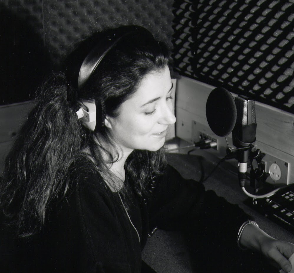 Voice artist Kate Parker recording  voiceover in the booth